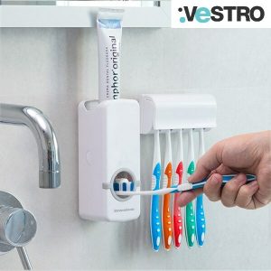 Eroga-dentifricio automatico con griglia per spazzolini 1 Eroga-dentifricio automatico con griglia per spazzolini
